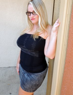 18 year old girl Agnes uncovers her perky tits as she gets completely naked